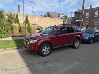 Red Ford Escape exterior, front three-quarter view